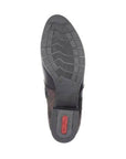 Outsole view of black Rieker 78658 ankle boot with durable tread pattern and red Rieker branding for reliable grip and comfort.