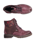Pair of Burgundy lace-up boots with distressed accents, floral cuff, inside zipper and a low heel.