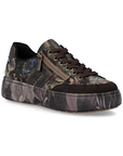 A low-top platform sneaker with dark brown accents, dark brown laces, and a deep purple and brown floral camouflage pattern on the upper and midsole.