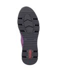 A black outsole with tread lines and red Rieker logo in heel.