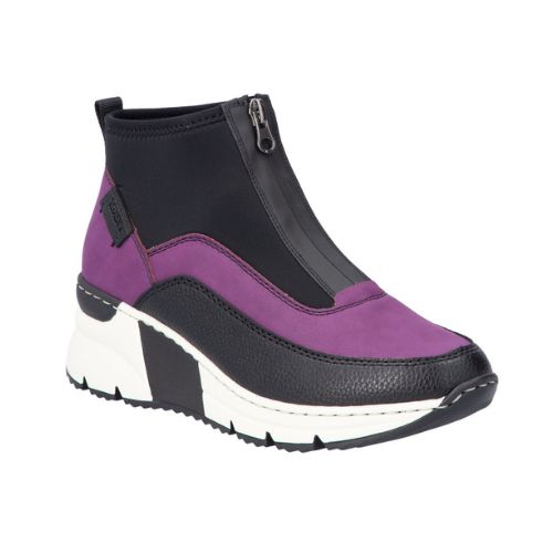 A purple Rieker top zipper sneaker with black accents and black and white wedge outsole.