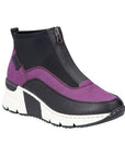 A purple Rieker top zipper sneaker with black accents and black and white wedge outsole.