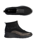 Pair of black sneaker ankle boots with front zipper, brushed accent upper, bronze accent and black wedge outsole.