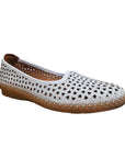 White ballet flat shoe with cutouts and brown outsole.