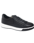 A black leather low-top sneaker with a side zipper, black laces, and a thick white midsole and black outsole.