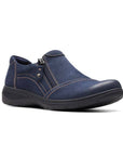 Navy blue Clarks Carleigh Ray slip-on shoe for women featuring contrast stitching, side zipper, and lightweight comfort for everyday use.