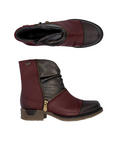 Pair of Women's ankle boots in red and brown with asymmetrical faux zipper and low heel.