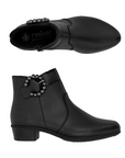 Pair of black ankle boots with decorative bead buckle, inside zipper and low heel.