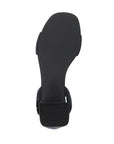 Black outsole with light tread and black heel.