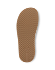 Tan outsole with a zigzag pattern.