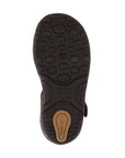 Bottom sole of Kids Stride Rite Harper Fisherman Leather Sandal featuring non-slip rubber outsole with circular grip patterns for toddler safety.