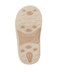 Beige kids outsole with sensory response pads and Stride Rite logo on heel.