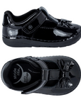 Pair of Black Patent kids Mary-Janes with Velcro closures, Black SR logo'd black footbed and patent bow on toe.