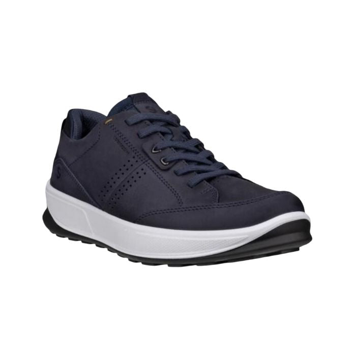Navy leather sneaker with thick white midsole and black outsole.