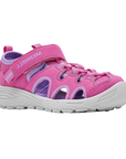 Pink fisherman sandal with Velcro strap, bungee lacing, purple accents and a gray outsole.
