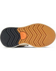 Black and tan zig-zag pattern outsole with orange Sorel logo in middle.