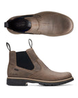 Stone brown Chelsea boot with dark elastic goring, heel pull tabs and outsole. Clarks logo on heel of insole.