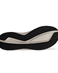 Black and white textured outsole of sneaker. Ecco logo is stamped near the toe.