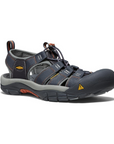 Women's KEEN Newport H2 Sandal in dark gray with orange accents, featuring quick-cinch lacing and protective toe for hiking and water use.
