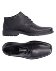 Side and top views of the Rieker B0011 men's lace-up dress boot showing sleek black leather design and breathable construction.