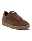 A brown suede sneaker with matching brown laces, accent stitched panels and a gum rubber outsole.