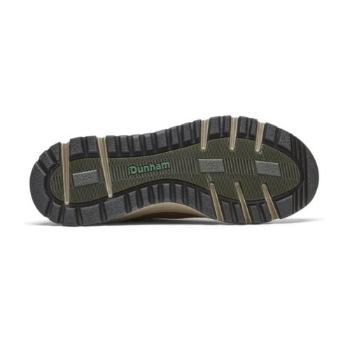 Outsole of brown Dunham Glastonbury Ubal II Sneaker with deep tread pattern for waterproof grip and outdoor stability.