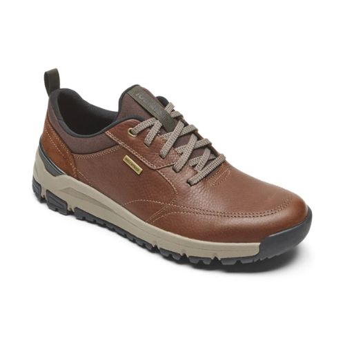 Men's Dunham Glastonbury Ubal II Sneaker in brown with beige sole, waterproof leather upper and rugged outdoor-ready design.