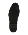 Black light treaded dress shoe outsole.