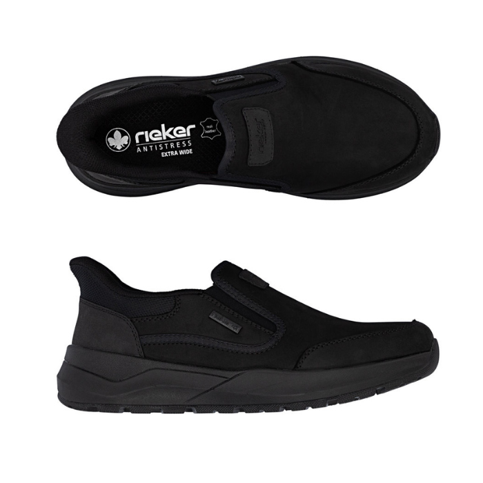 Pair of black leather slip on shoe with side goring elastic and thick black rubber outsole.