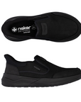 Pair of black leather slip on shoe with side goring elastic and thick black rubber outsole.
