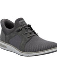 Grey slip on sneaker with mesh panels, elastic laces and white midsole.