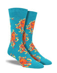 Men's Socksmith Socktopus Socks in turquoise with bold orange octopus print. Colourful cotton crew socks perfect for ocean-themed style.