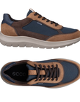A pair of low-top casual sneakers with navy blue mesh, tan suede, dark brown panels, black ecco logo'd footbed and a light grey outsole.