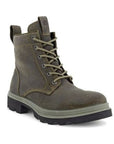 A brown full-grain leather combat boot with an adjustable lace closure and a rubber outsole.
