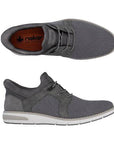 Pair of Grey slip on sneakers with mesh panels, elastic laces, Rieker logo'd orange footbed and white midsole.