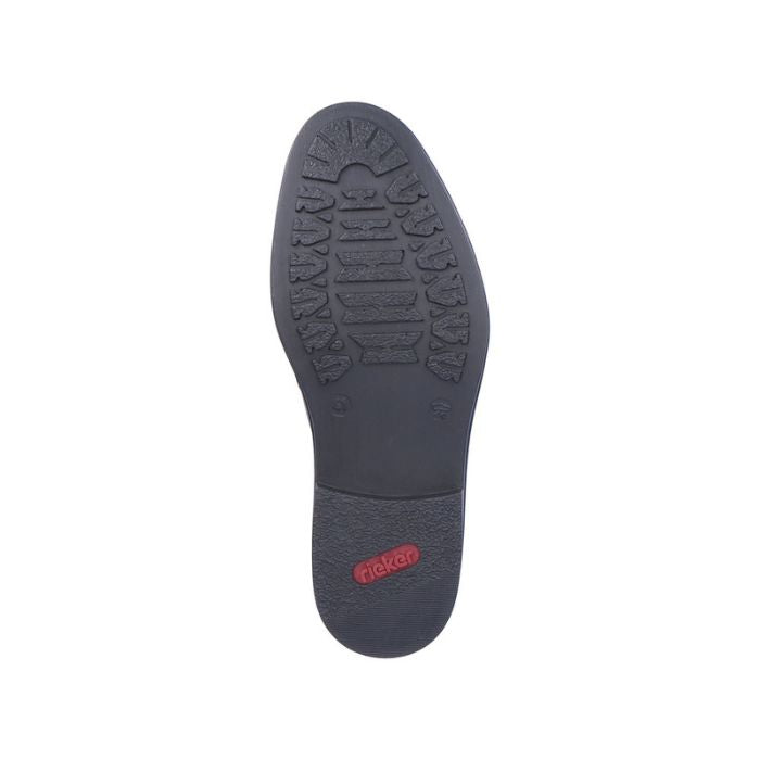 Bottom view of black Rieker 17659 dress shoe showing rubber sole with grip. Designed for stability and lightweight performance.