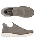 Pair of Rieker beige mesh slip on sneakers with beige footbed and thick off-white outsole.