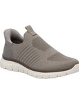 Rieker beige mesh slip on sneakers with thick off-white outsole.