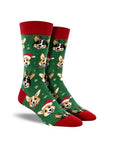 Green socks with festive corgi dogs wearing Santa hats, antlers and scarves and red cuff, heel and toe cap.