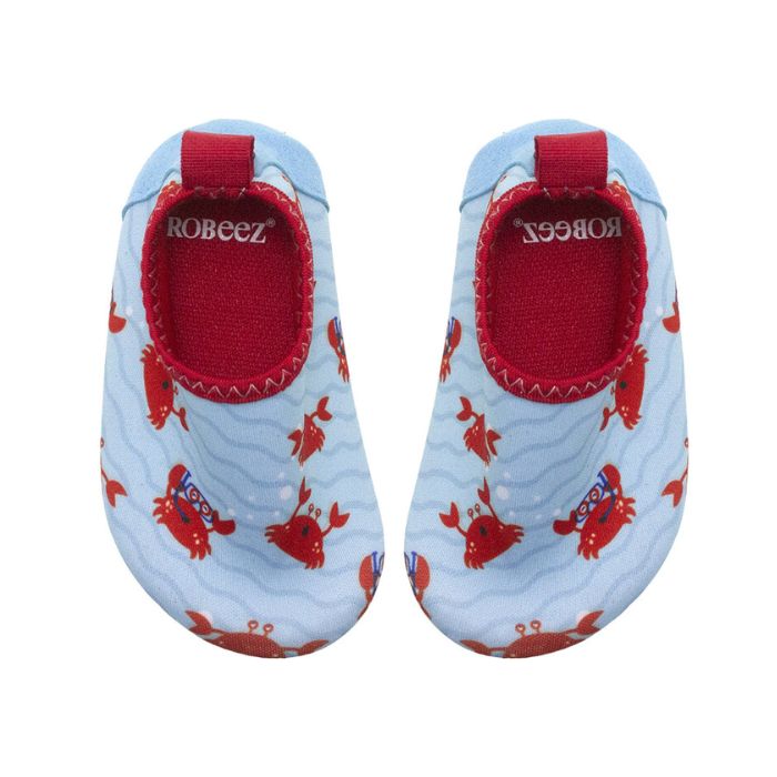 Pair of Blue spandex baby shoes with red crabs snorkeling and swimming and red Robeez logo'd footbed.