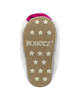 Robeez suede outsole with star pattern and logo in middle.