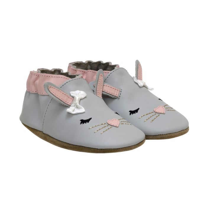 Pair of grey and pink leather Bunny baby shoes with 3D ears, bow, sleepy eyes over heart shaped nose and gold whiskers.
