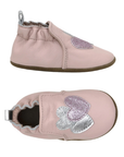 Pair of pink baby shoes with glittery hearts and cinched cuff.