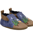 Pair of baby's leather soft sole shoes with a camper and tree under moon and star design with brown accents and cinched cuff.