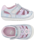 Pair of toddler fisherman sandals with iridescent pastel blue and pink synthetic leather, a hook-and-loop strap, a decorative flower applique up vamp, pink Stride Rite logo'd footbed and a white outsole.