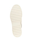 Off white outsole of the Lotta sneaker, displaying light tread.