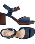 Denim Clarks AmbyrLyn Faye sling-back heeled sandals for women, featuring cushioned insole and flexible sole for all-day wear.