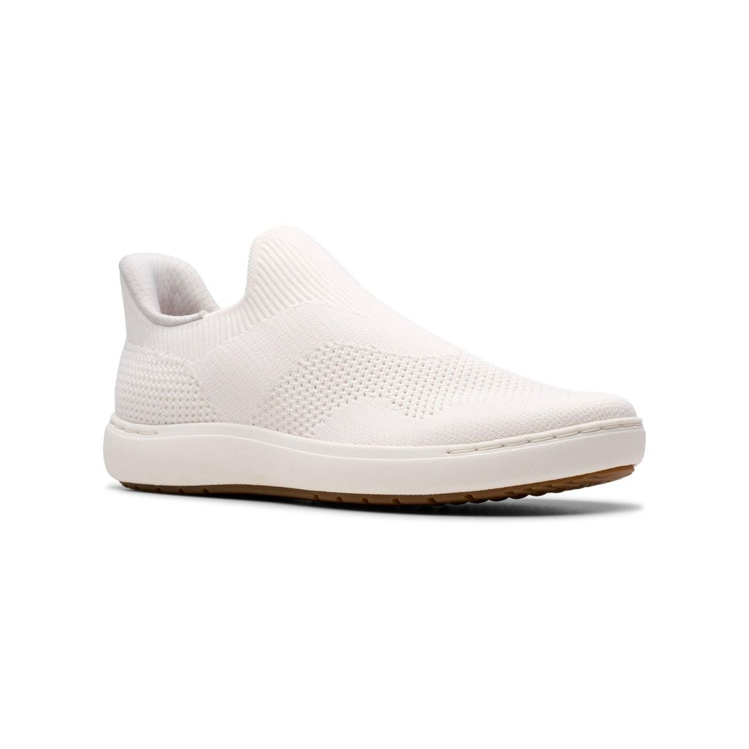 Women's Clarks Nalle Step Knit Sneaker in white with a stretch textile upper and cushioned sole. Slip-on design ideal for casual wear and comfort.