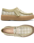 Pair of Light sage and white checkered Wallabee inspired shoe with Clarks tan logo'd footbed and a ribbed beige rubber platform outsole.