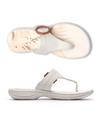 Pair of White thong sandals with a brown octagonal buckle, floral beige footbed and white outsole.